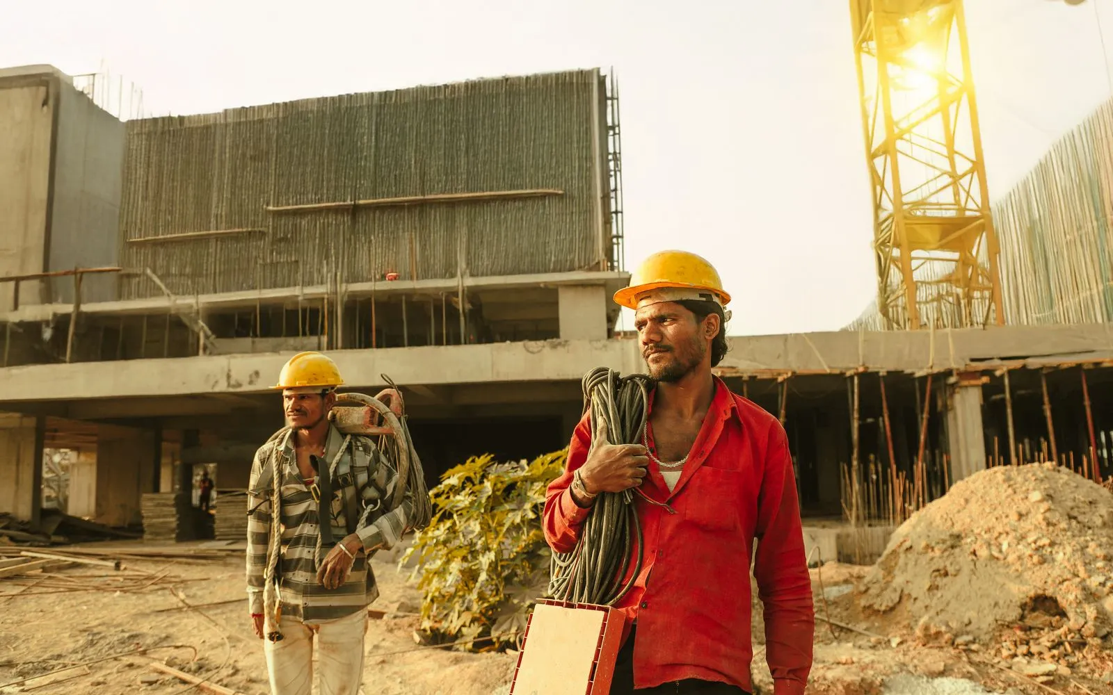 Hard hats and a crane on a UK construction site